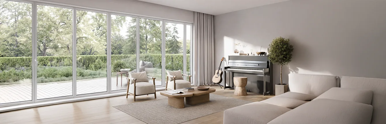 Wide interior with uPVC-framed sliding doors opening to a garden
