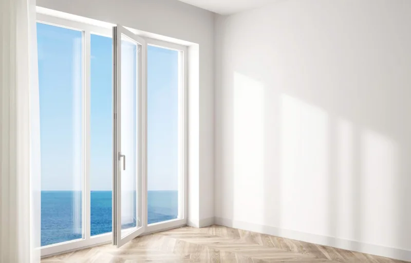 White uPVC casement profile system in an architectural opening